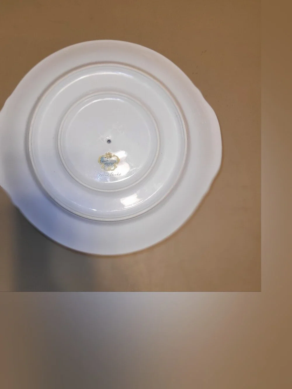 Meito China Hand Painted Porcelain Floral Gravy Boat with Attached Saucer.
